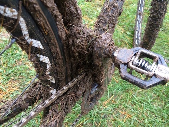 Appleman cross bike covered in mud at race