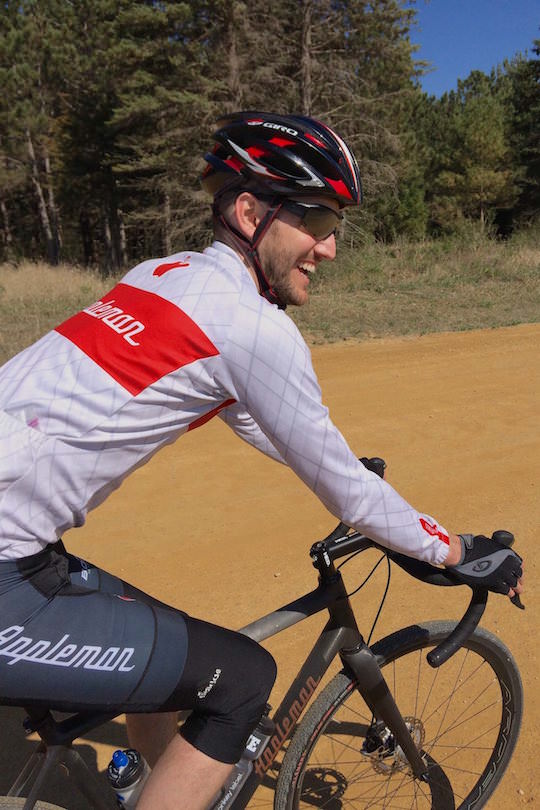 Matt Appleman riding gravel and smiling